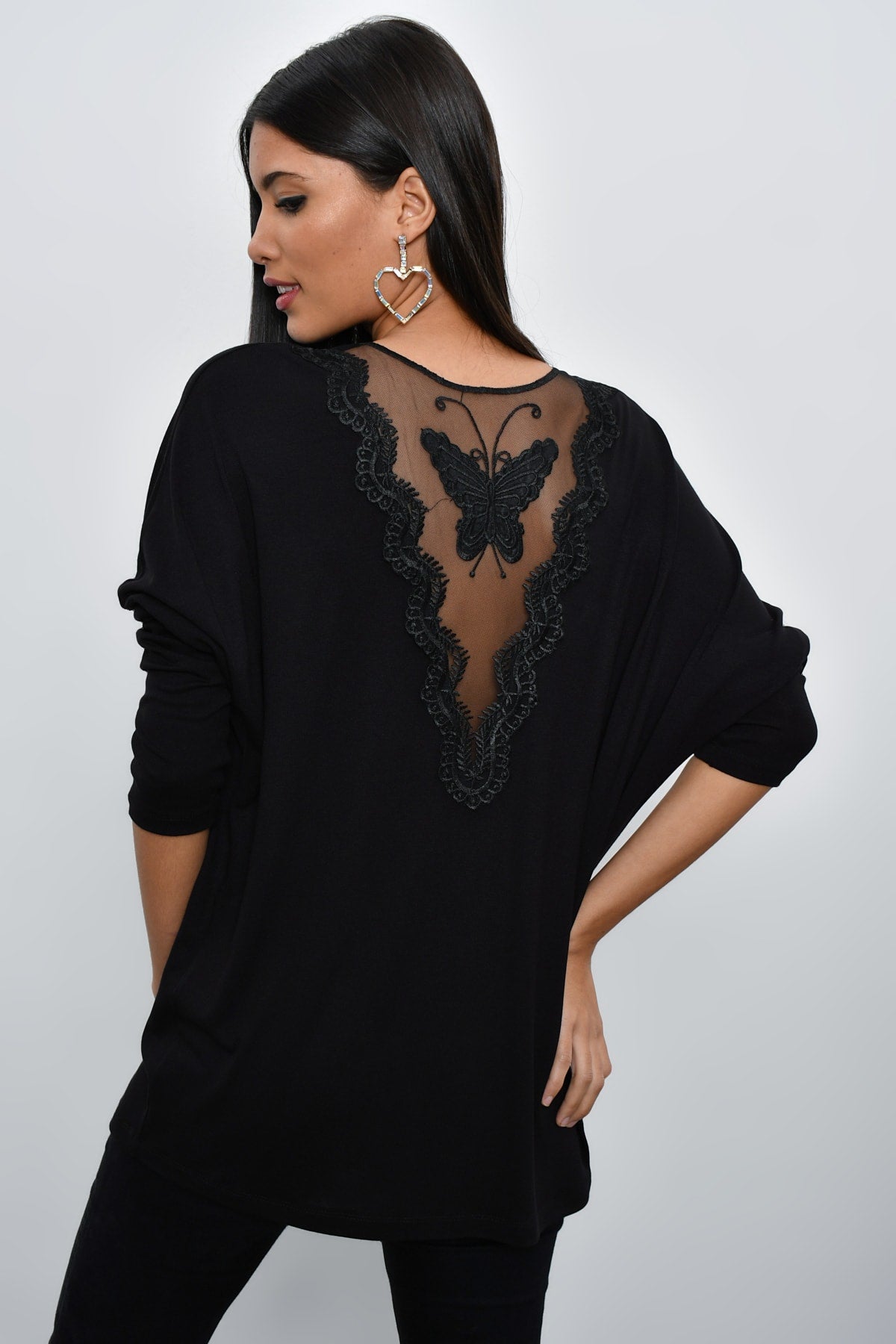 Black women's blouse with sheer details, Stylish look with sexy V-neck design, Butterfly embroidered back blouse, Plain-colored design suitable for daily and comfortable wear, Affordable black blouse made of polyester and elastane fabric